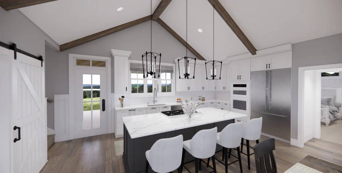 Kitchen with white cabinets and a contrasting cooktop island under a vaulted ceiling.