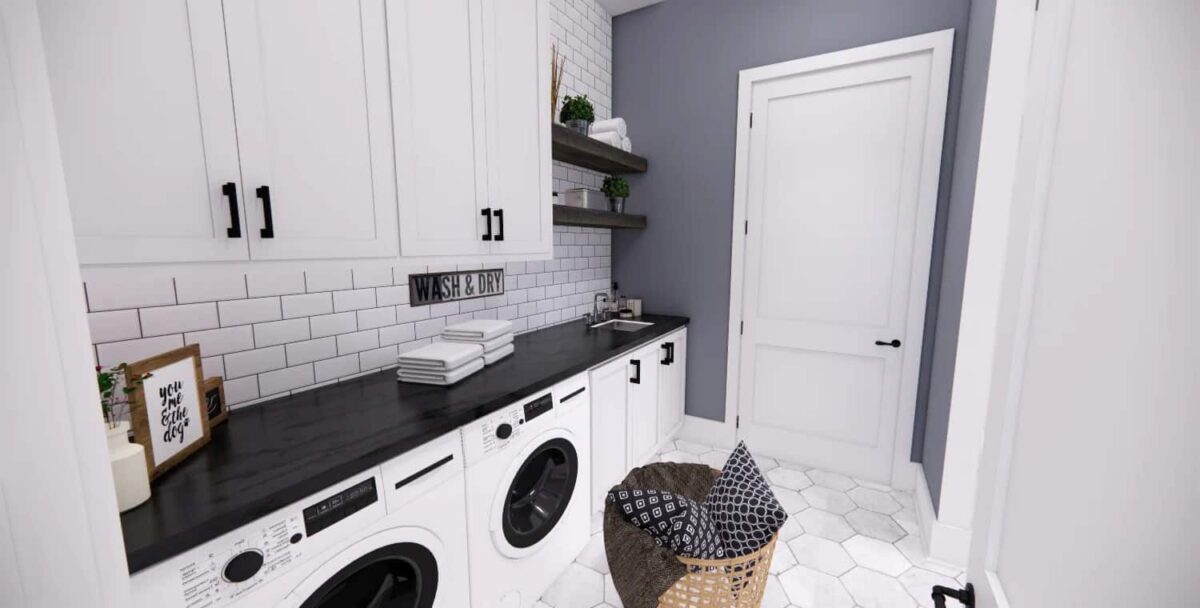 Laundry room with white cabinets, a marble countertop, and floating shelves fixed against the subway-tiled backsplash.