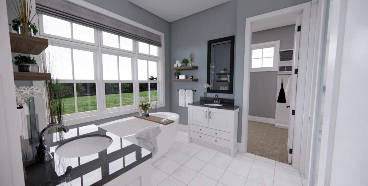 Primary bathroom with his and her vanities, a soaking tub, and a walk-in closet.