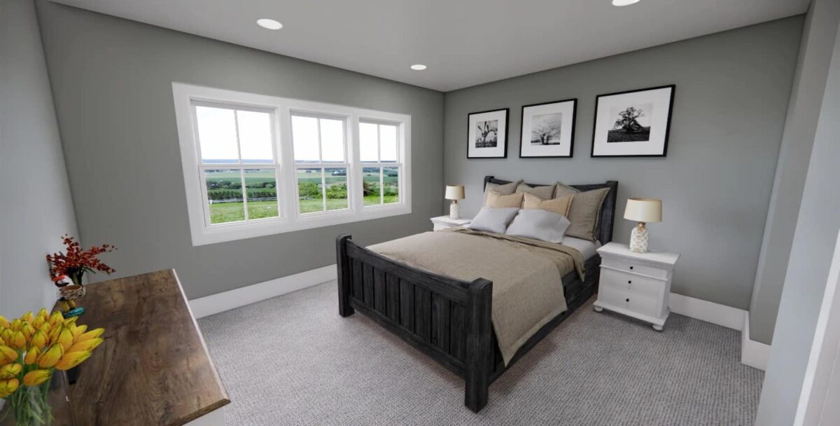 Secondary bedroom with a dark wood bed and gray walls adorned by white and black artworks.