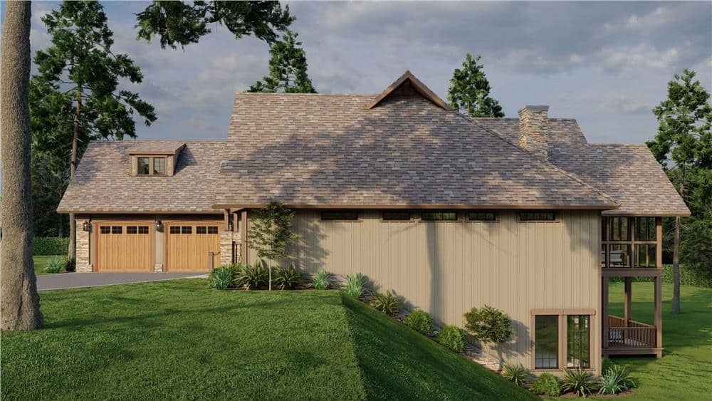 Right view with a courtyard garage topped with a shed dormer.