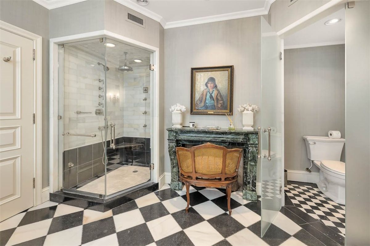 Bathroom with a walk-in shower and a toilet. 