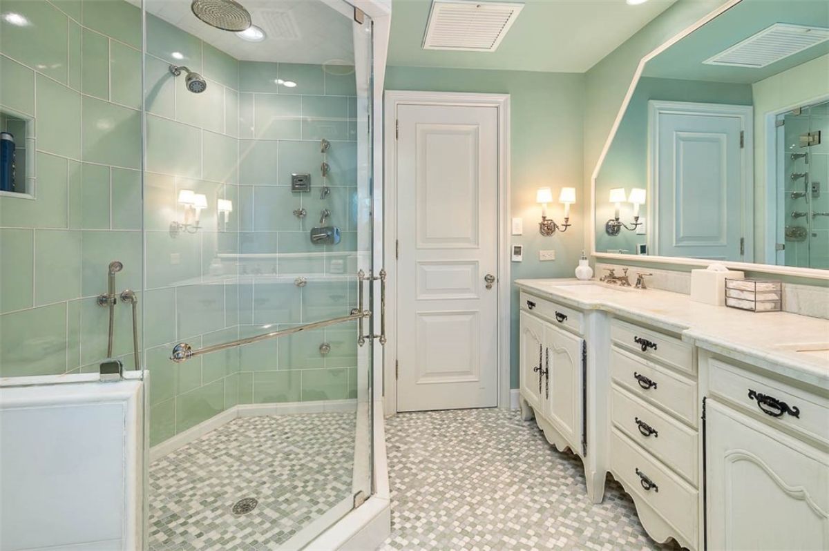 Bathroom with a walk-in shower and sink. 