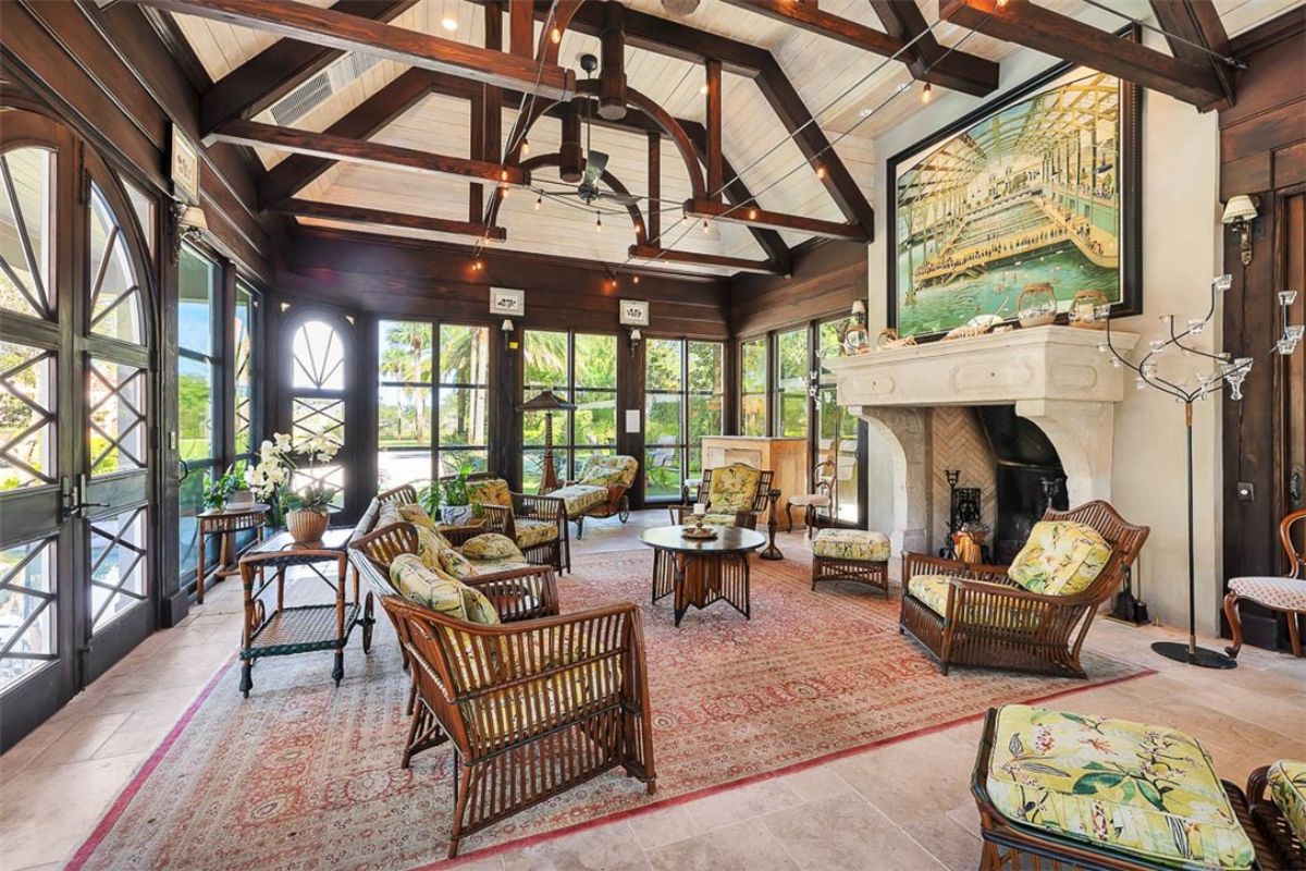 Living room with custom lights and a fireplace.