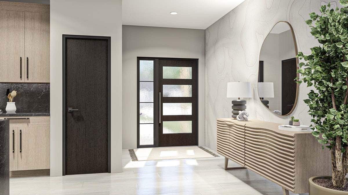 Foyer with a glazed front door and a contemporary console table adorned with a decorative mirror.