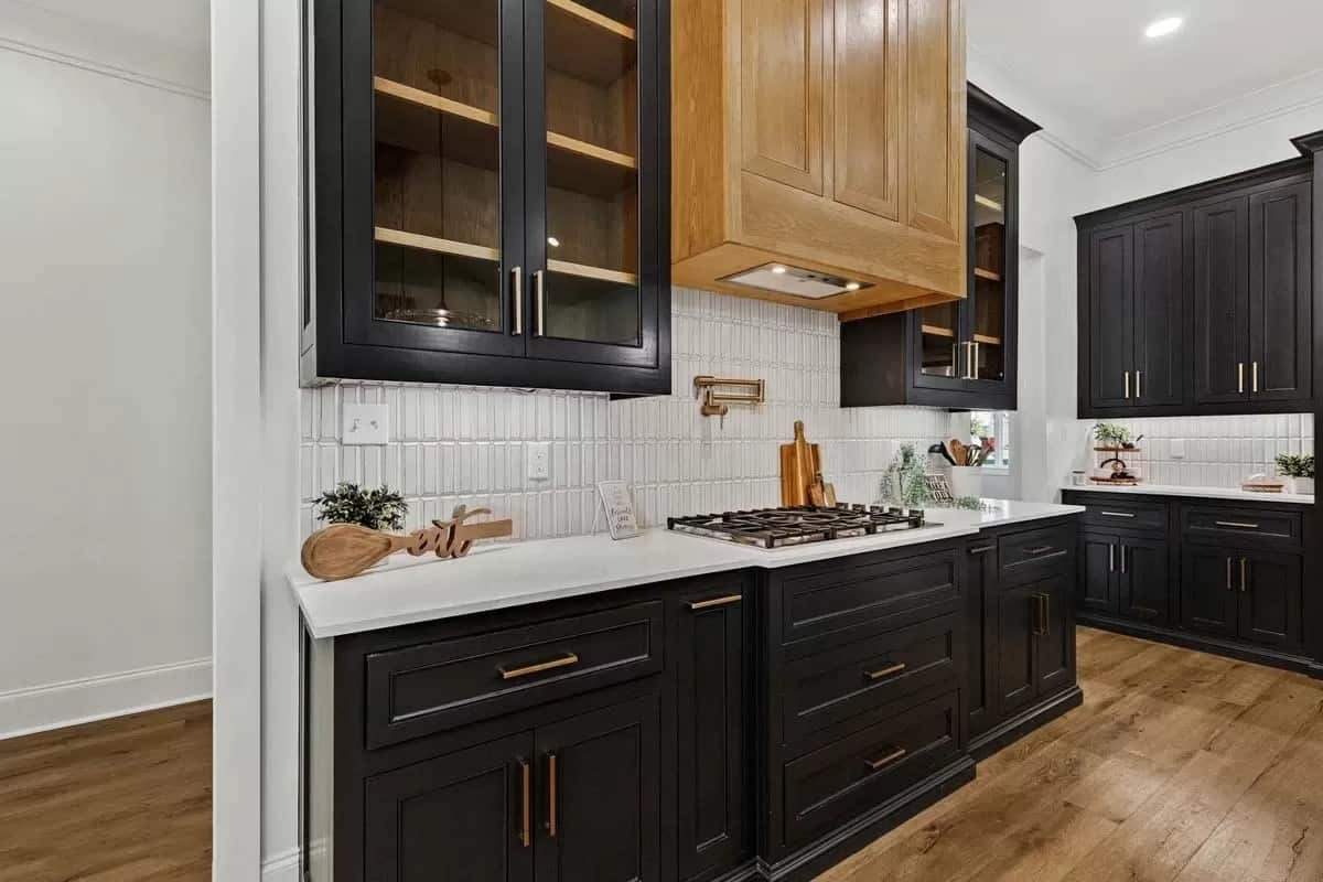 Open doorways at the back of the cabinets lead to the prep kitchen.