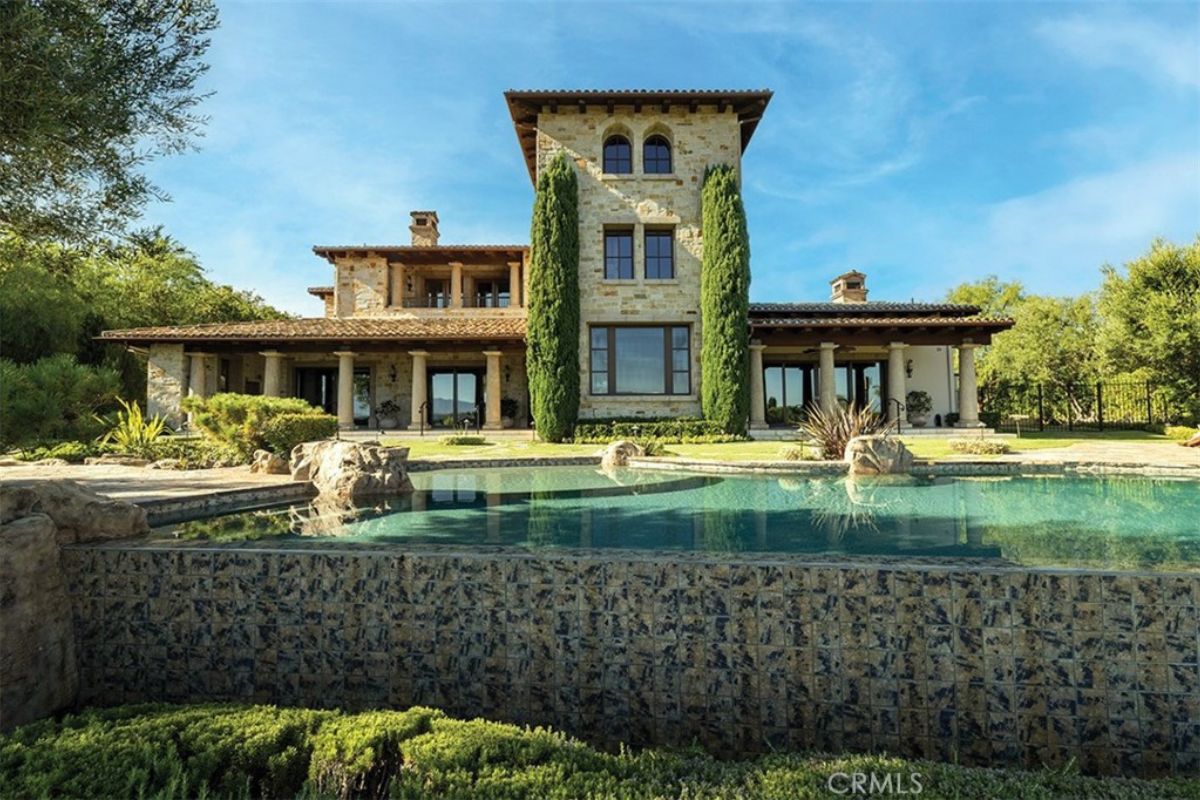 A swimming pool in the backyard.