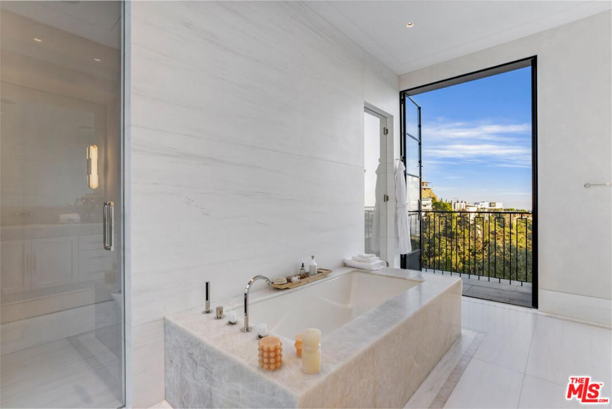 Bathroom with soaking tub and a shower.