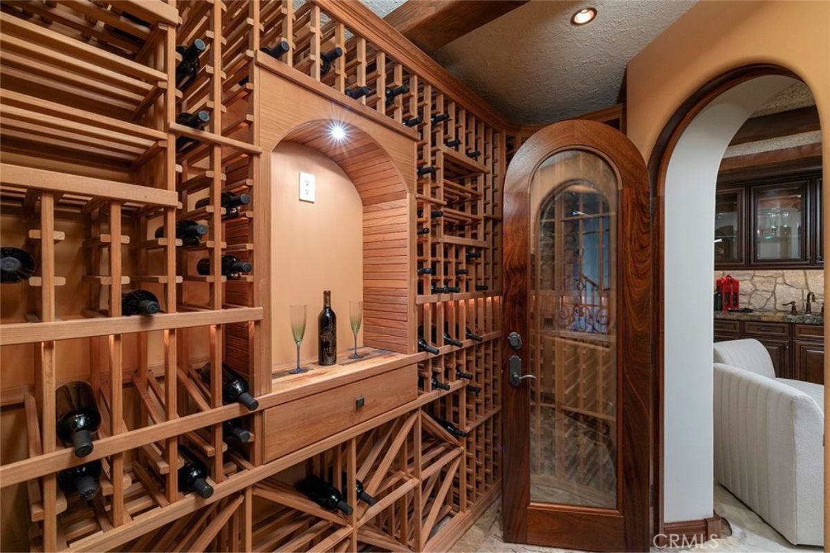 A wine cellar with a wooden wine rack.