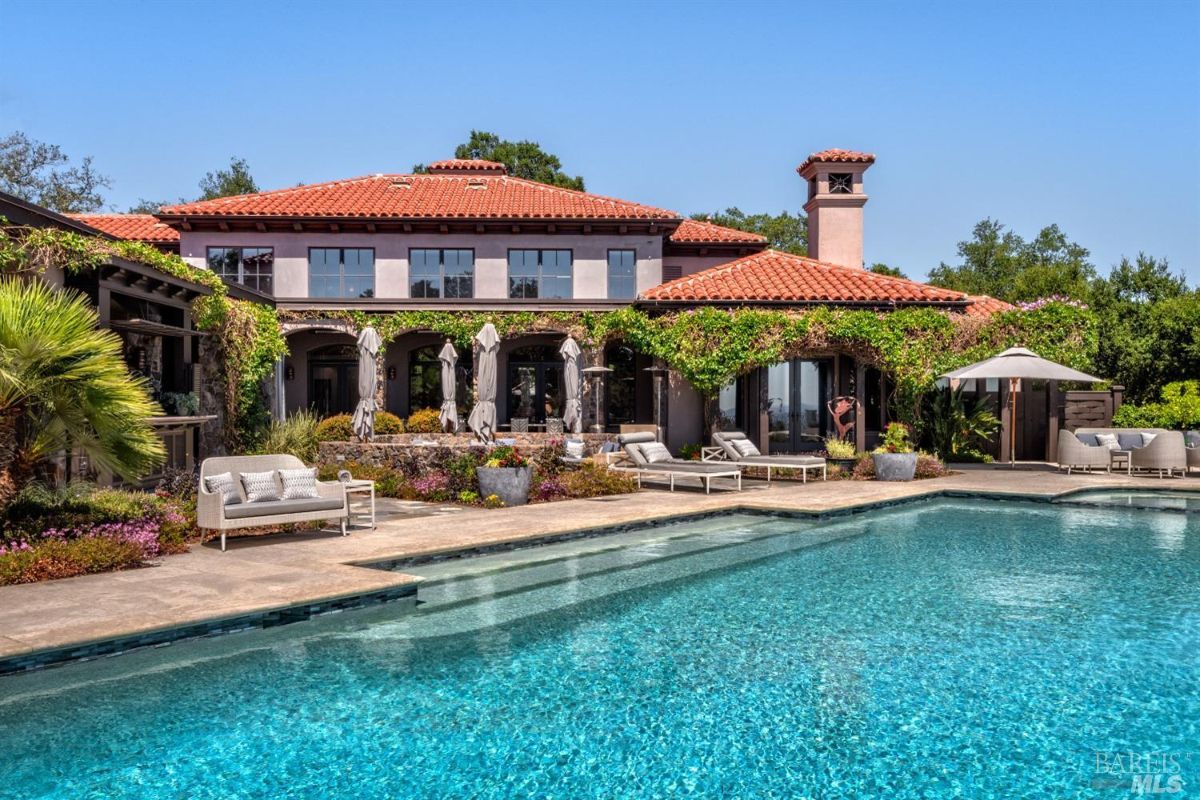 Pool with lounge chairs.