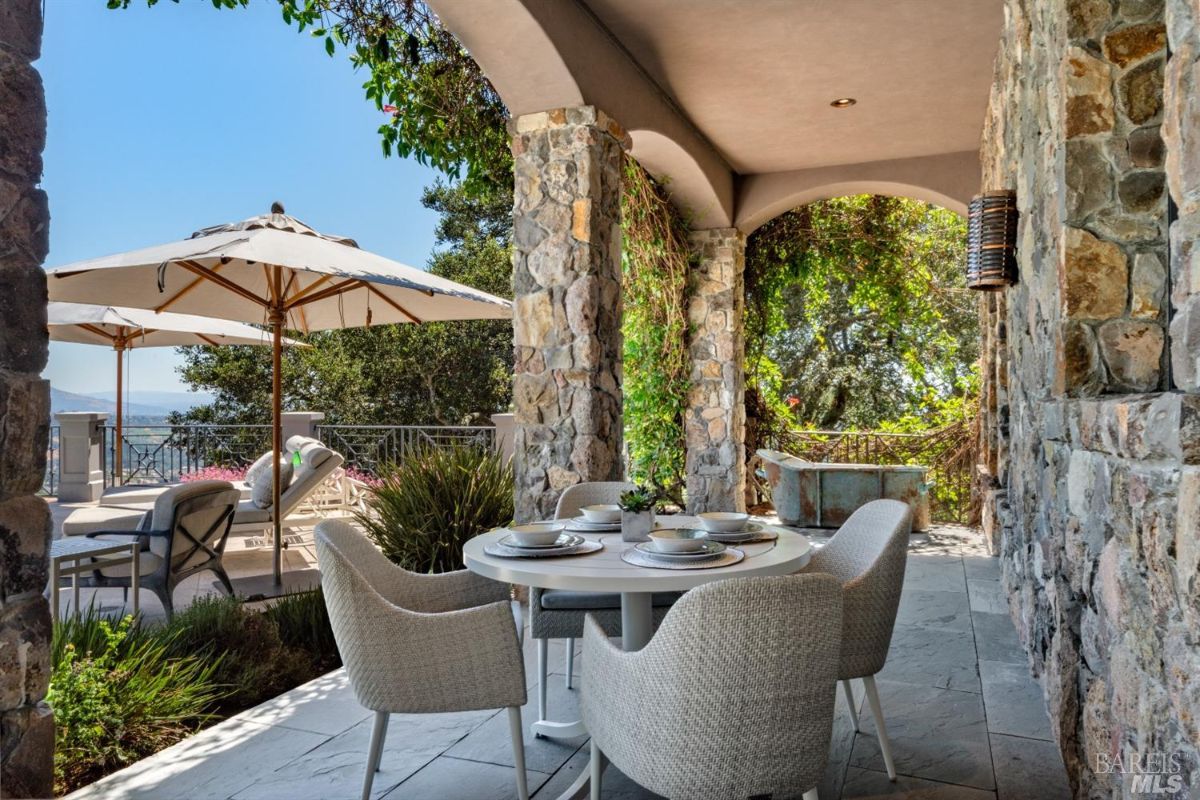 Patio with a table and chairs.