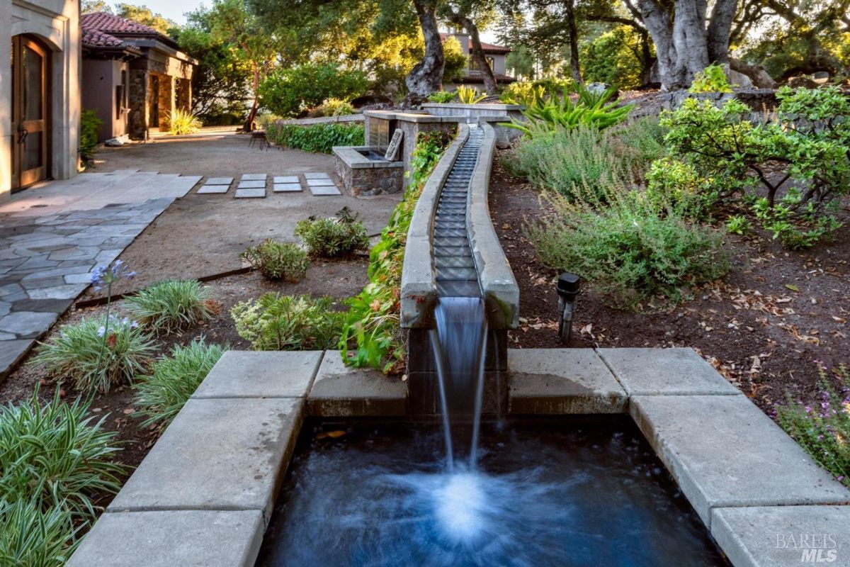 Man-made waterfalls in the middle of a garden