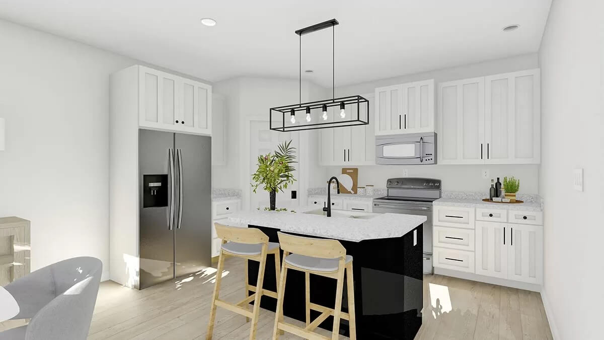 Kitchen with white cabinets and a contrasting island.