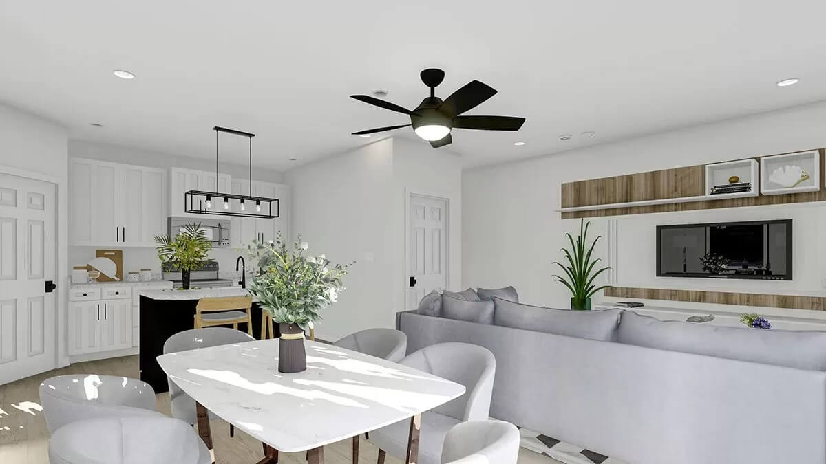 Dining area with a marble-top table surrounded by round back chairs.