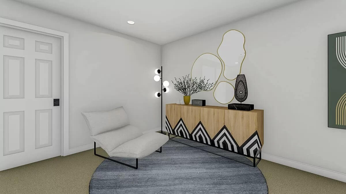 Foyer with a cushioned chair and a wooden console table adorned by decorative mirrors.