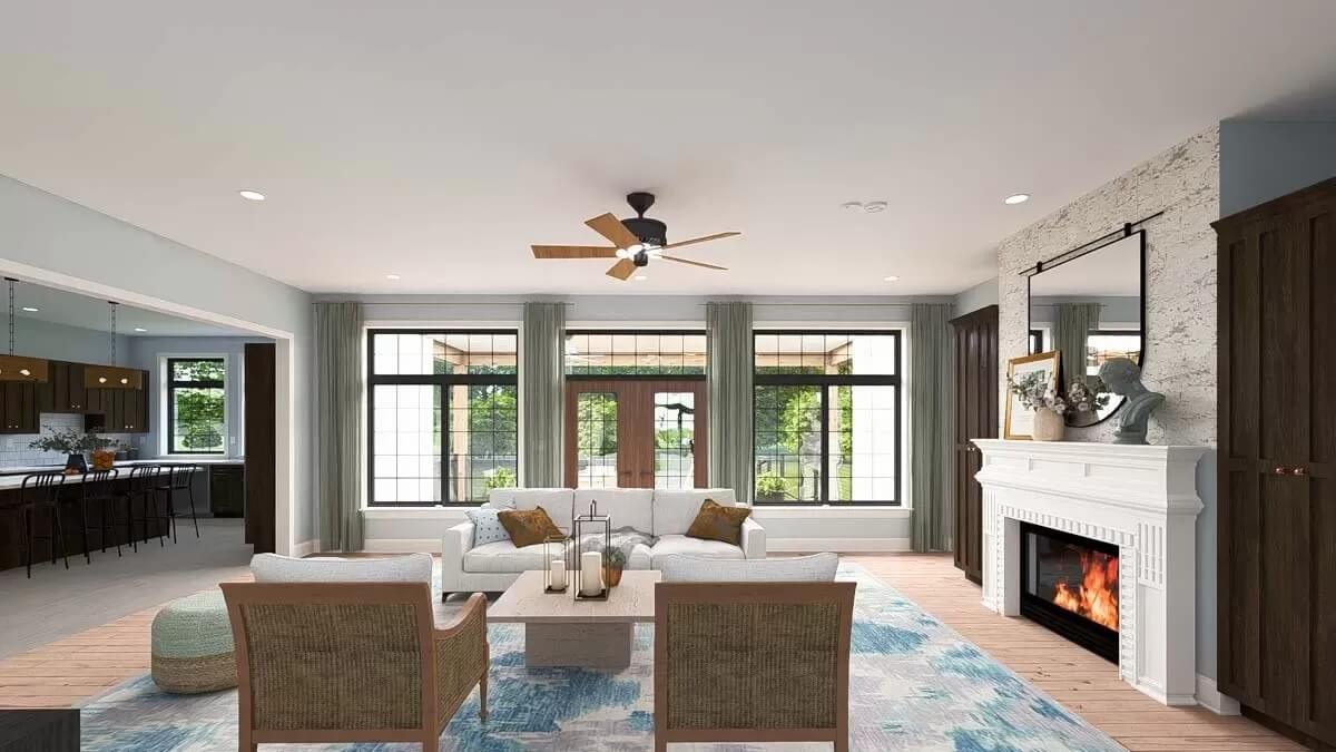 A trio of windows flood the family room with natural light.