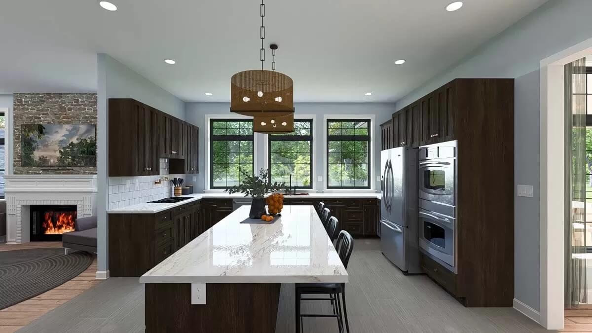 Kitchen with dark wood cabinets and a matching island with bar seating.