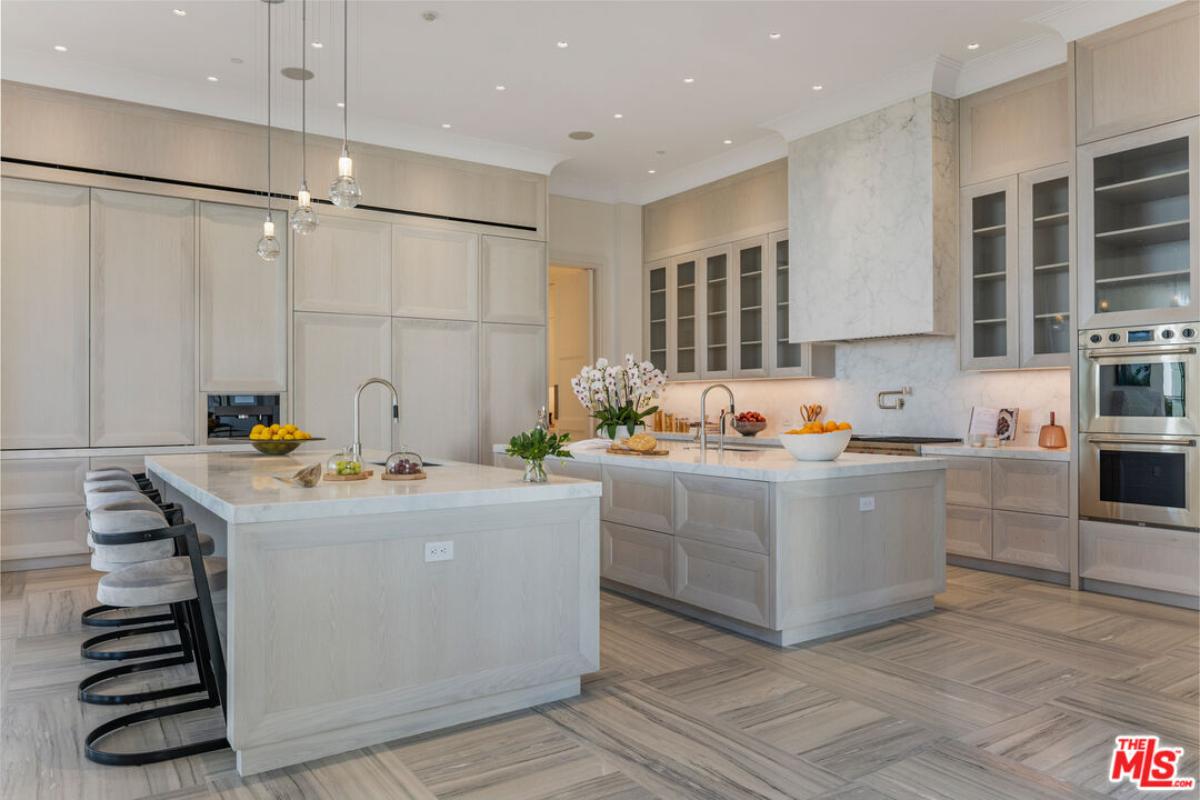 Kitchen with custom cabinets and custom lights.