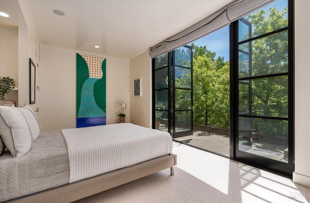 Bedroom with carpet flooring.