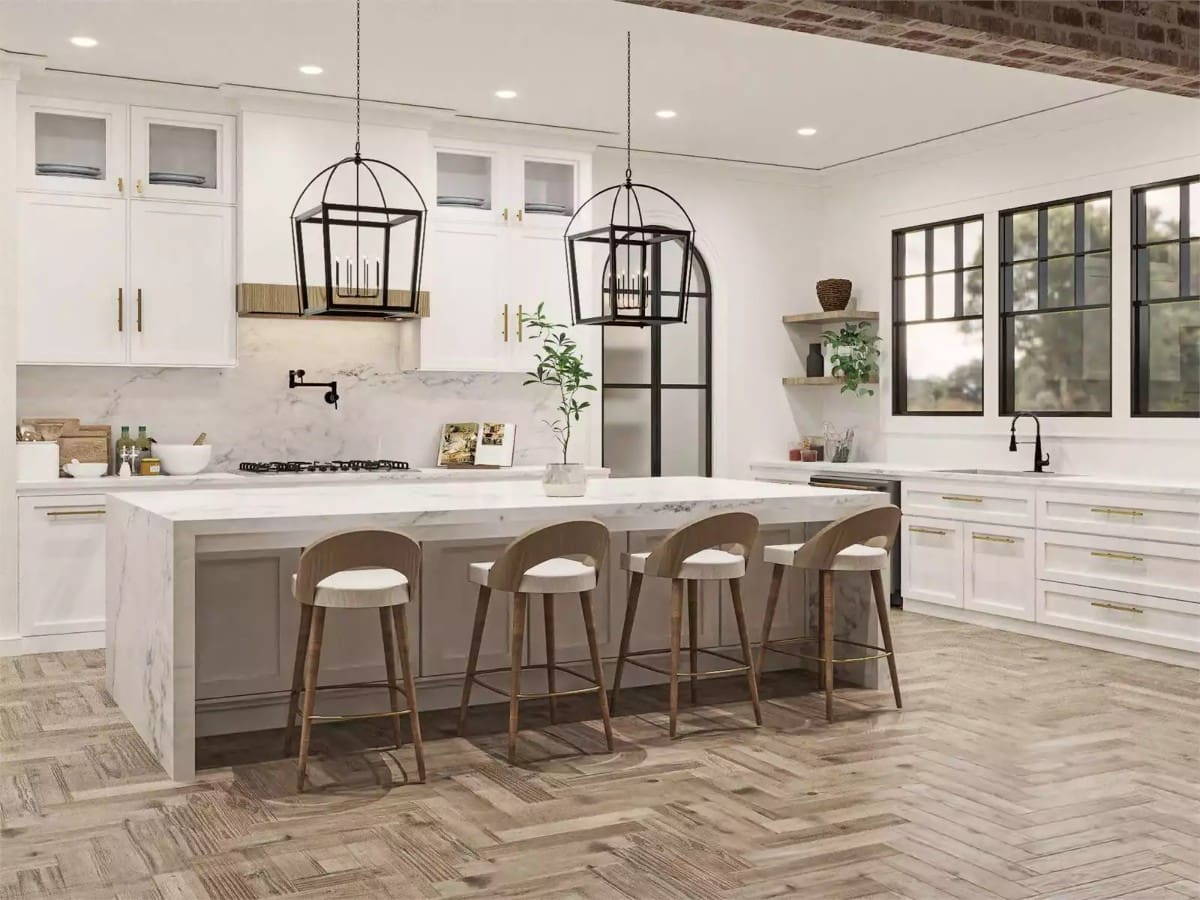 Kitchen with white cabinets and a waterfall island over the parquet flooring.