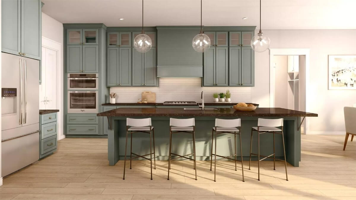 Kitchen with gray cabinets and a matching island with seating for four.