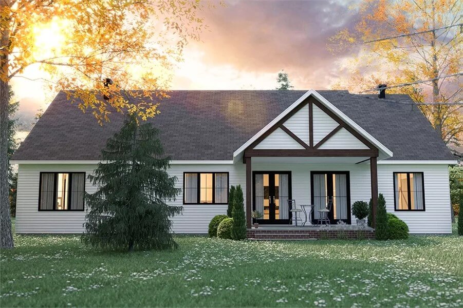 Rear view of the house with French doors and a covered terrace.