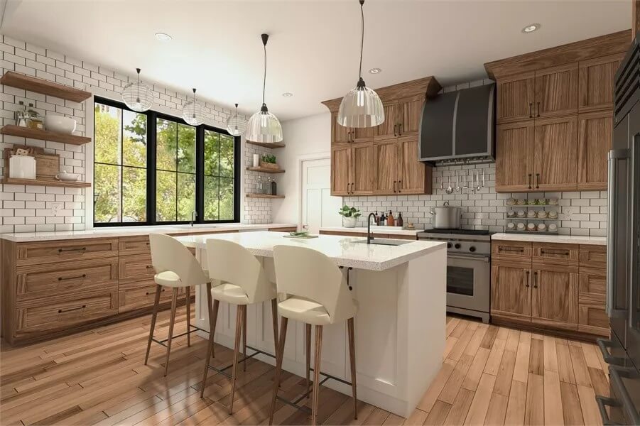 Kitchen with a breakfast island and wooden cabinetry that blends in with the hardwood flooring.