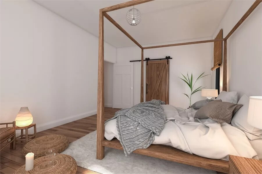 The primary bedroom includes an ensuite bath hidden behind the sliding barn door.