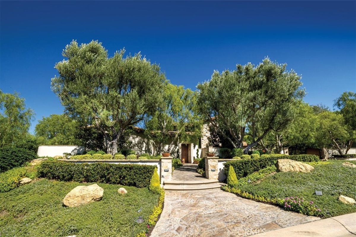 A stone walkway surrounded by grass.