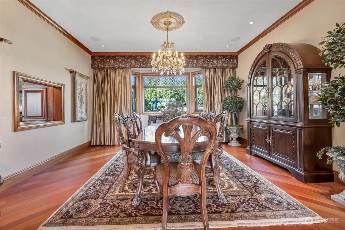 Dining room with a chandelier.