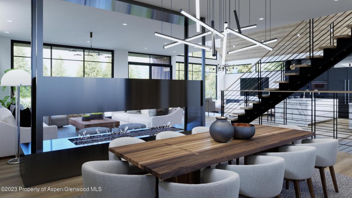 Dining room with a wooden table and chairs.