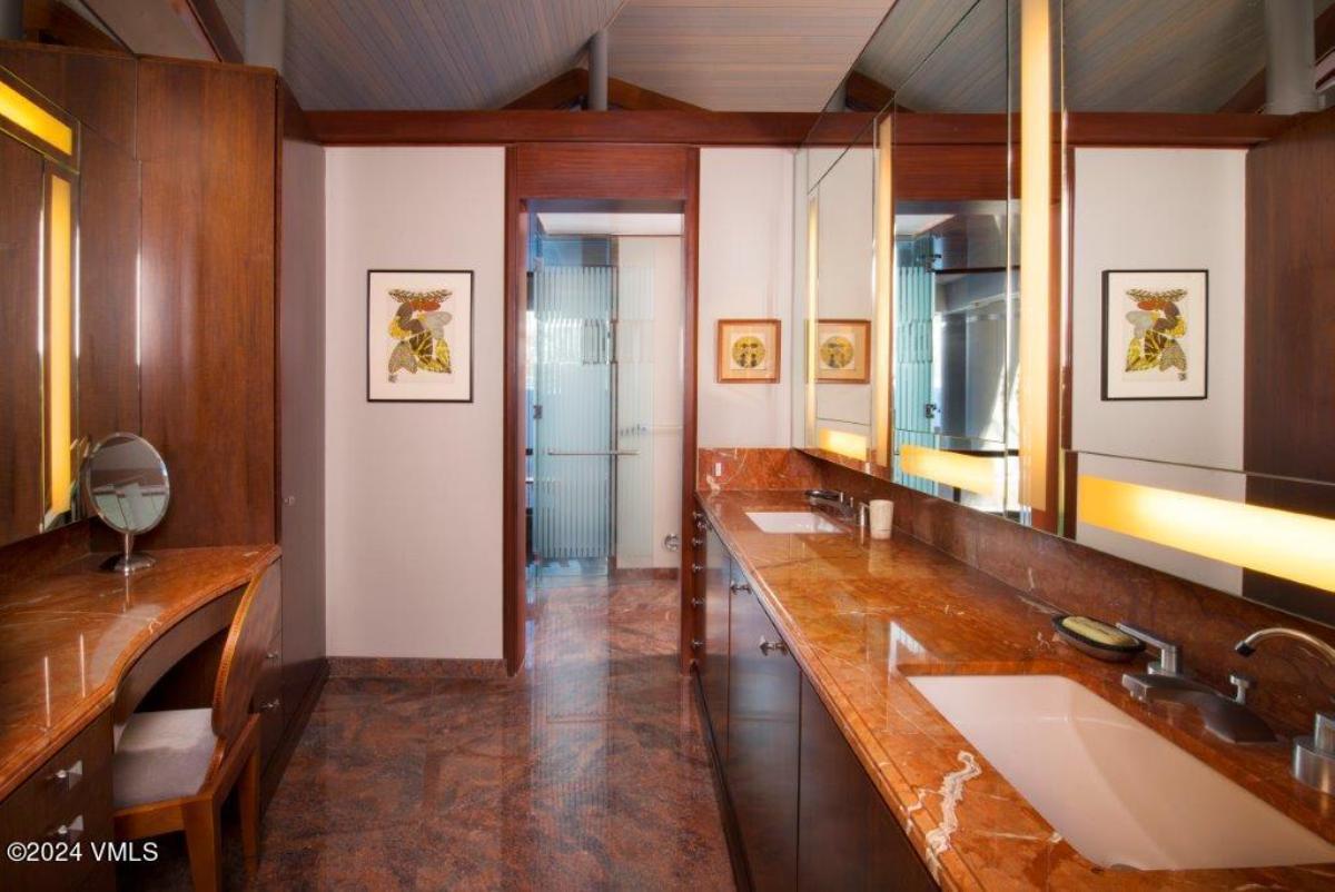 Bathroom with a custom-made vanity.