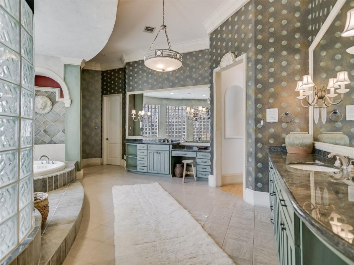 Bathroom with a custom-made vanity and a soaking tub.