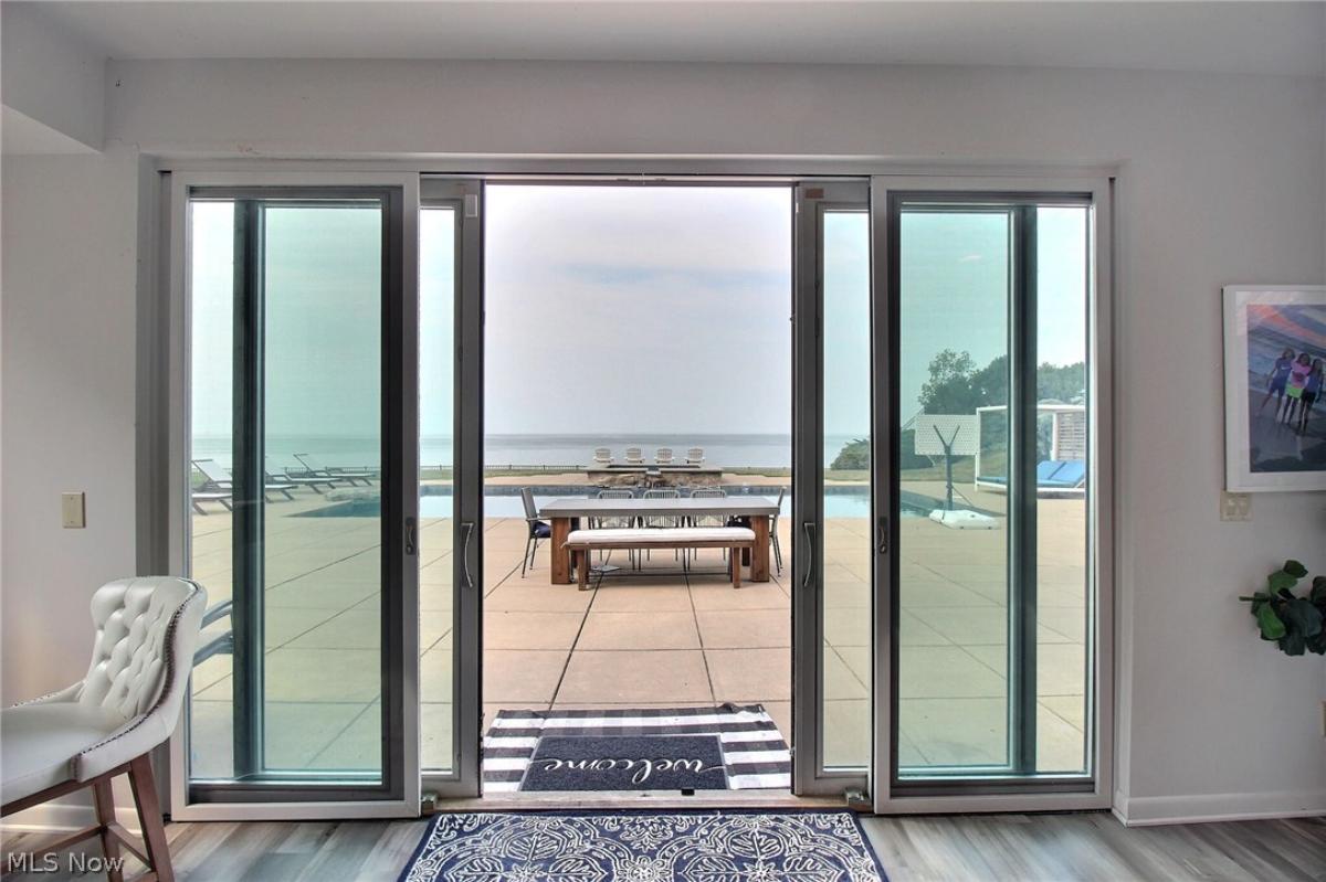 Patio with a dining table and chairs.