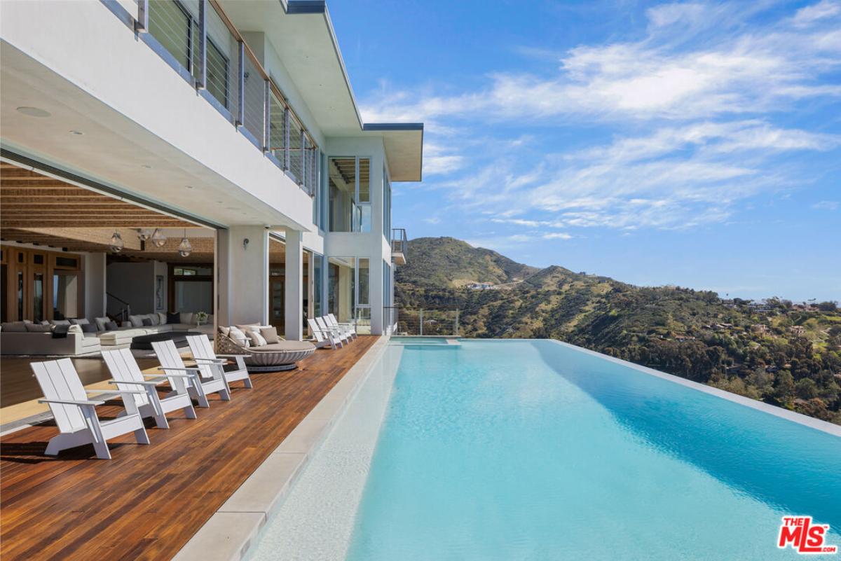 Pool with lounge chairs.