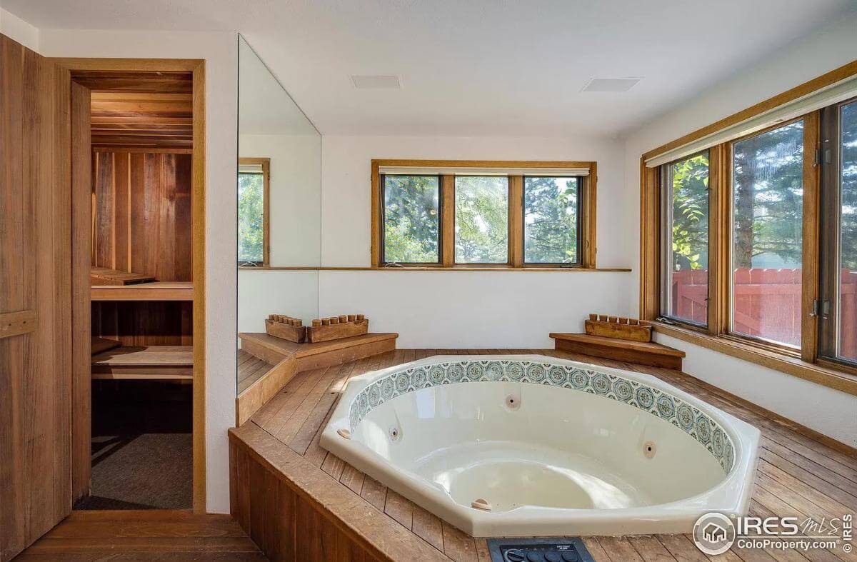 Sauna situated beside the whirlpool tub.