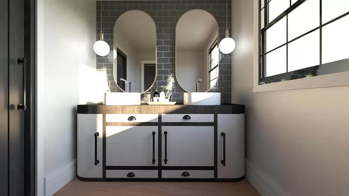 Bathroom with a large vanity topped by two vessel sinks and oval mirrors.