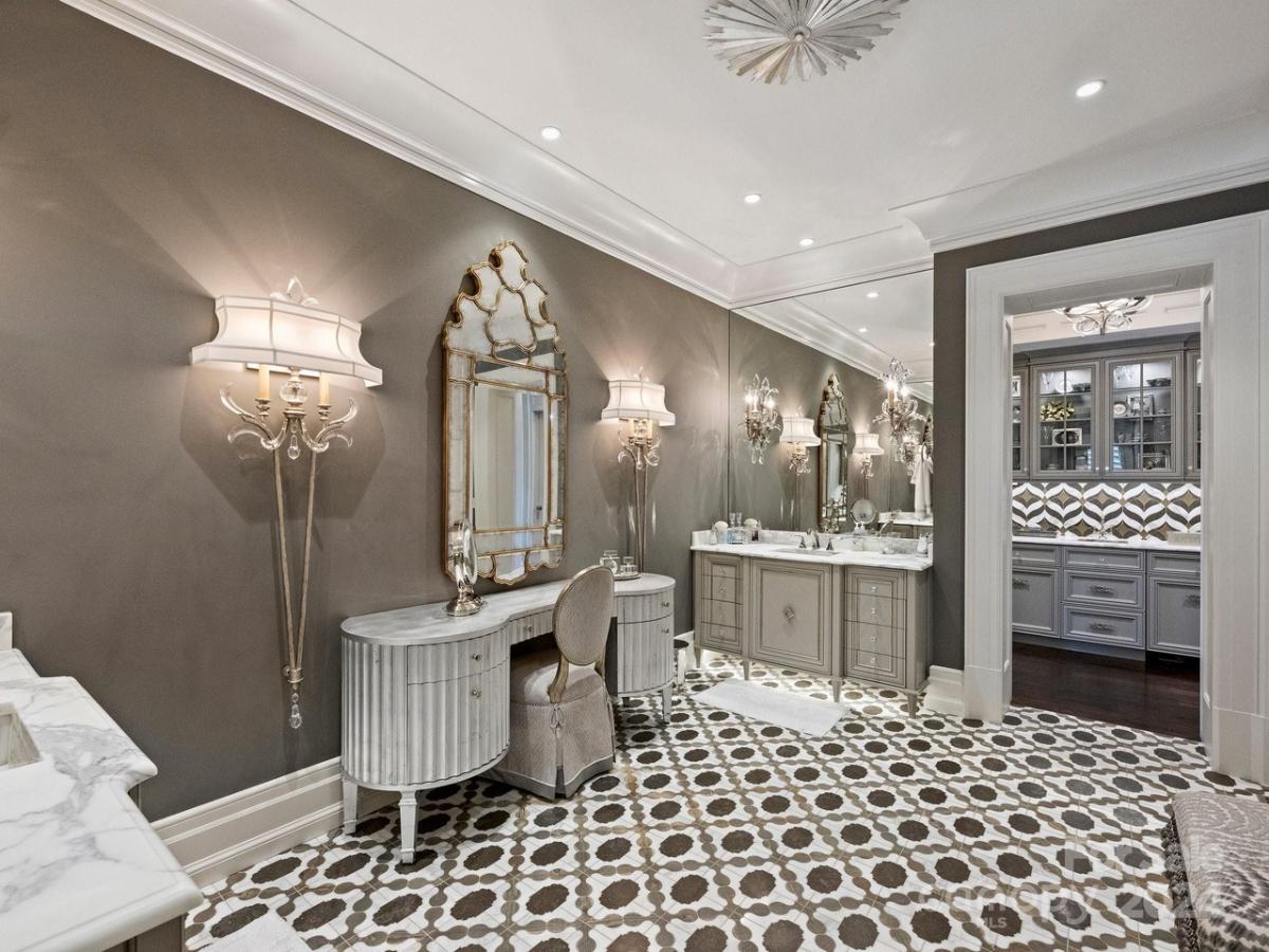 Bathroom with a custom-made vanities.