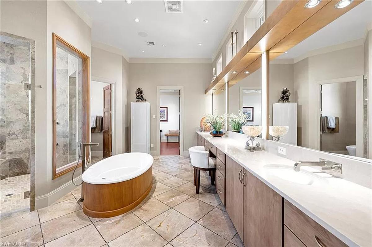 Bathroom with a soaking tub and a walk-in shower.