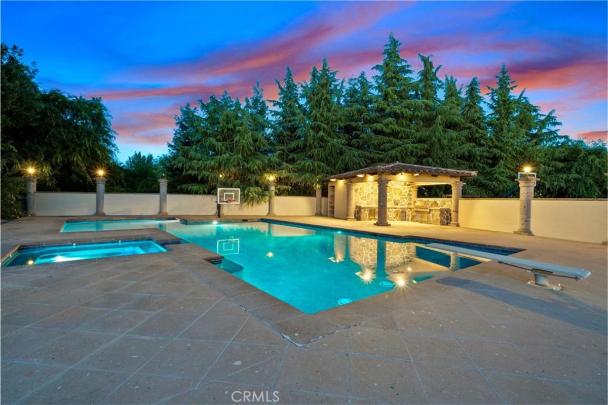 Pool with a grill area.