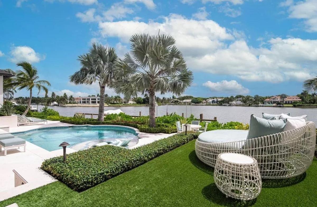 Pool with lounge chairs.