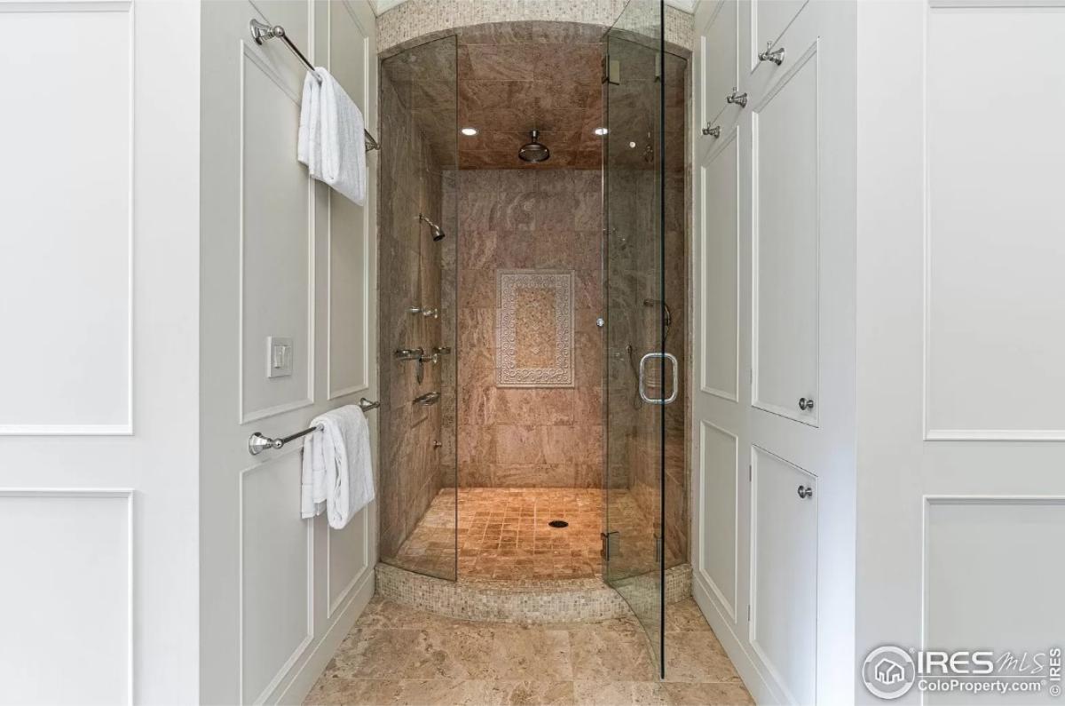 Bathroom with a walk-in shower.