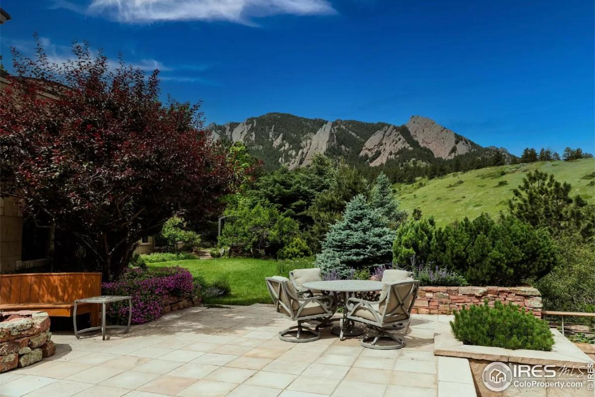 Patio with mountains in the background.