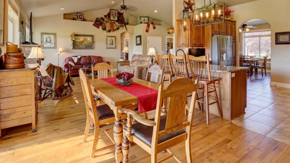 A great room with living space, dining area, and kitchen.