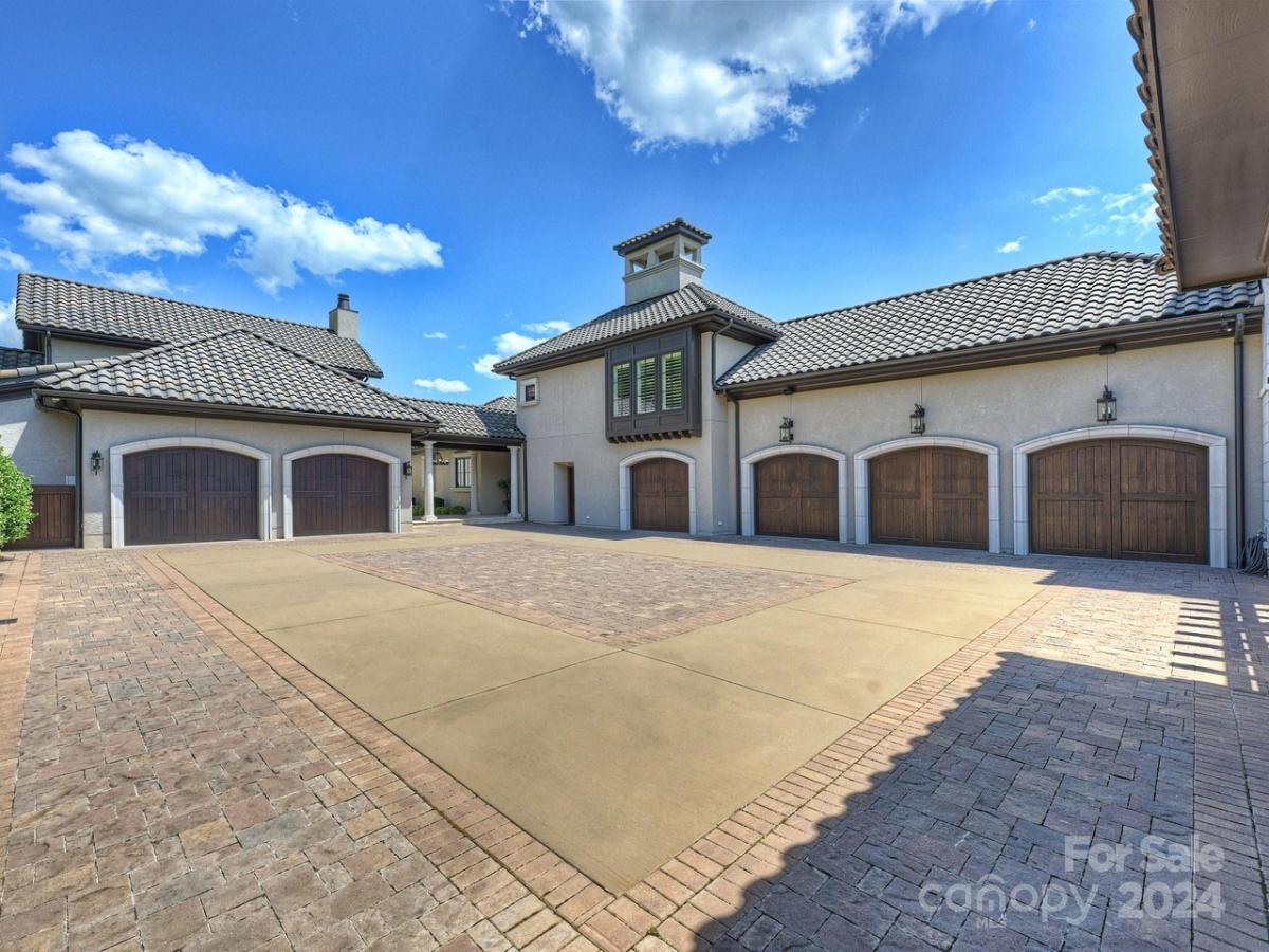 Garage with spacious driveway.