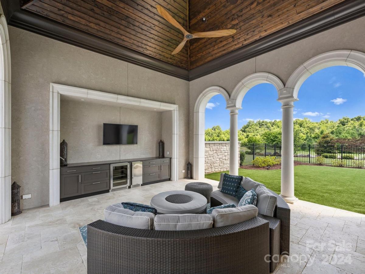 Outdoor living space with a TV.