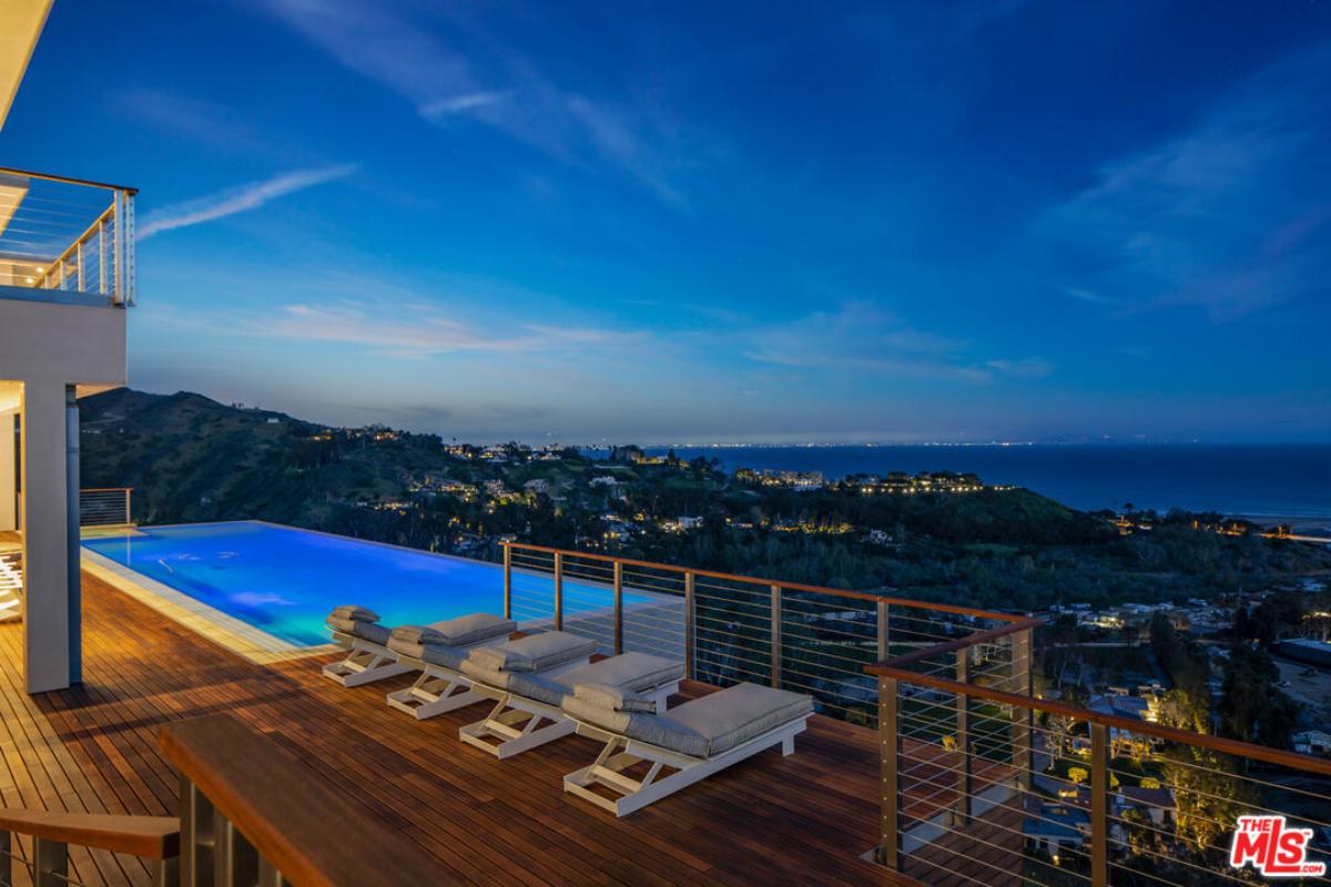 Pool with lounge chairs.