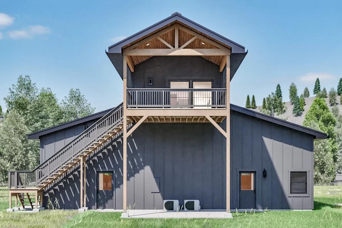 Rear view with covered patio and porch crowned by a gable roof.