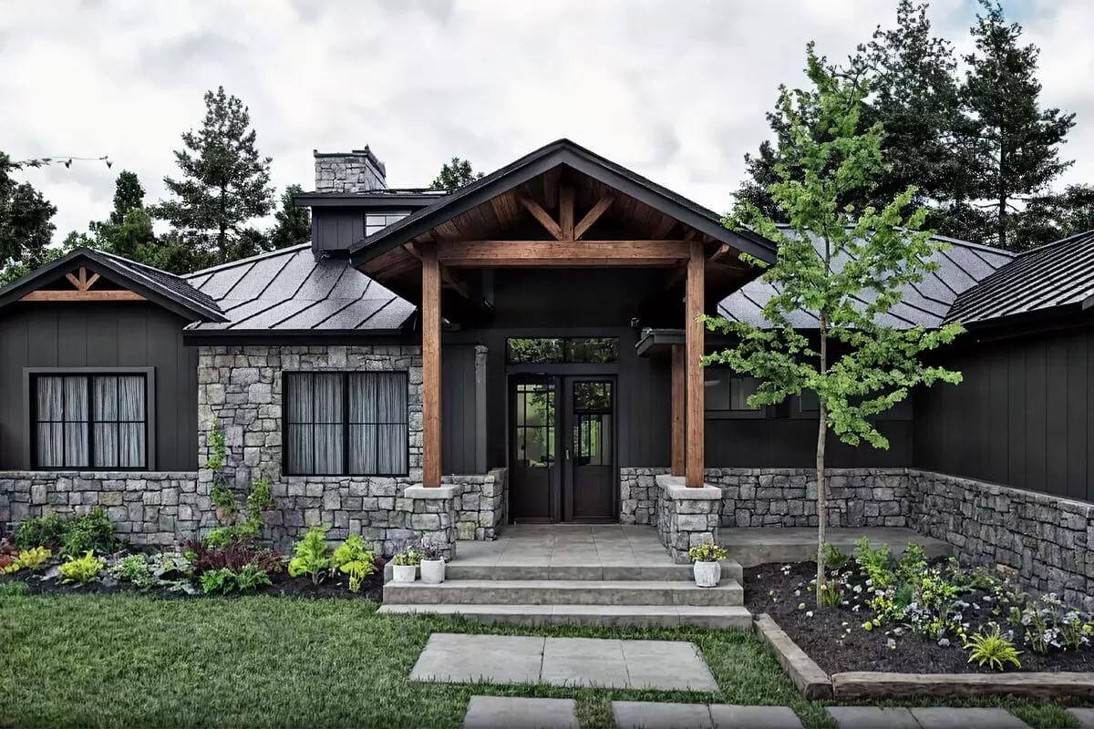 Front entry with a French front door and a concrete stoop.