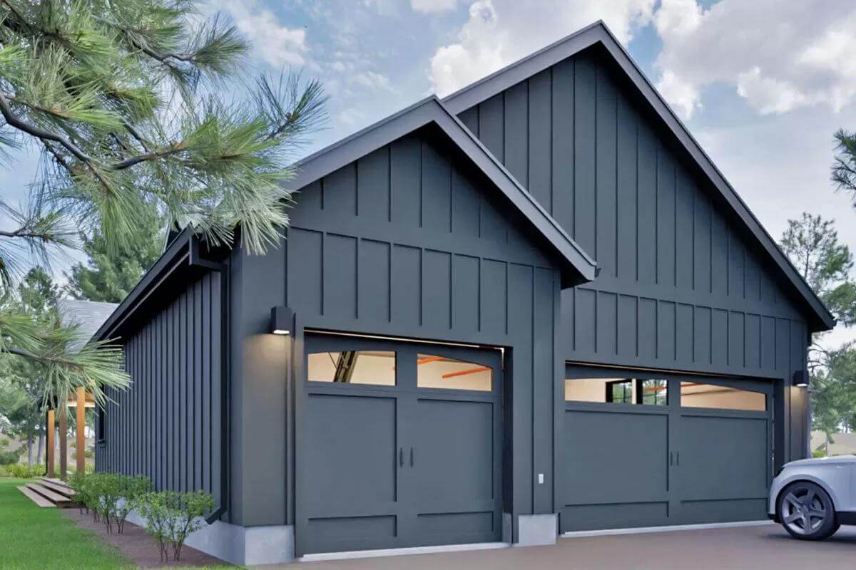 Left view showcasing the 3-car garage crowned by gable roofs.